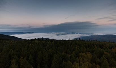 Obraz premium Moving clouds and autumn fog over the Black Forest
