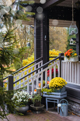 Traditional style porch, front door steps decoration at Halloween, Thanksgiving season