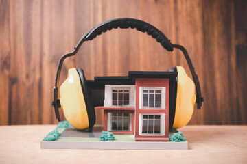 house is covered with headphones to reduce noise , Solving the problem of noise pollution around...