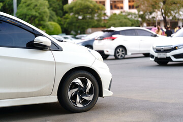 Obraz na płótnie Canvas White car side photo and soft focus background.