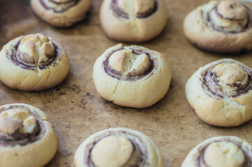 Fresh homemade baked goods on parchment paper. Mushroom-shaped shortbread cookies