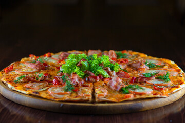 Classic pizza with salami, cheese, tomatoes, bell peppers, salad greens. Margherita Italian pizza with melted mozzarella cheese and tomato.