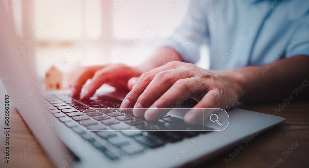 Leinwandbilder Data Search Technology Search Engine Optimization. male hands are using a computer notebook to Searching for information.Using Search Console with your website.