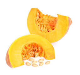 Pieces of ripe orange pumpkin and seeds on white background