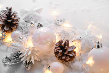 Obraz na płótnie Canvas Christmas balls and snowflake on abstract background