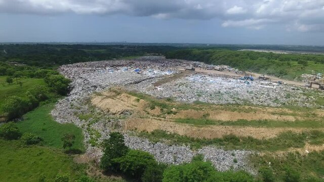 Aerial circling over Duquesa landfill and surrounding landscape. Santo Domingo