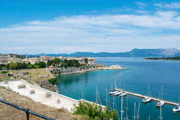 A view of Corfu town city center on the left and Mount Pantokrator, the highest peak of Corfu island, on the right, as seen from the Old Venetian Fortress