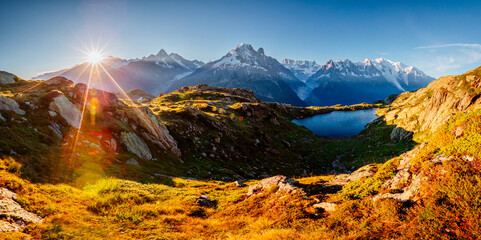 Mighty Mont Blanc glacier with lake Lac Blanc. Location Chamonix resort, Graian Alps, France, Europe.