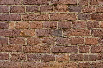 The texture of the old masonry of red brick.