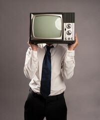 businessman with old retro television on his head