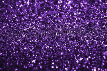 Purple glitter texture  sparkling shiny paper background for Christmas holiday wallpaper decoration, greeting and wedding invitation card design element, Xmas abstract background with copy space.