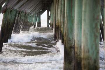 Morning waves under the fishing pier