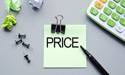 Lettering Price on a sheet of notes. Lettering content has implications for business content and...