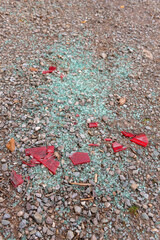 Smashed glass from a car window scattered on the ground