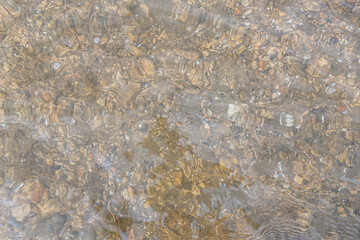 abstract background of pebbles at the bottom of the lake