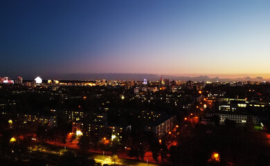 Fototapeta na wymiar Top view of the night city at sunset