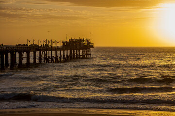 Sunset sunirse pier beach orange sky ocean