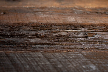 Rustic dark brown wood with saw marks