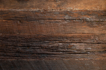 Rustic dark brown wood with saw marks