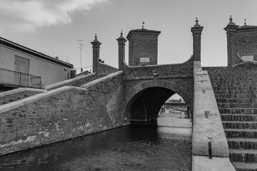 View of a Canal in Comacchio, Italy. Black and white, copy space