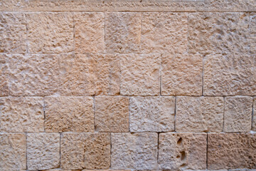 Tuff wall texture. Old wall background, castle walls