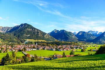 Fototapeta na wymiar Panorama view on Obersdorf in Allgau, Bavaria, Bayern, Germany. Alps Mountains in Tyrol, Austria.