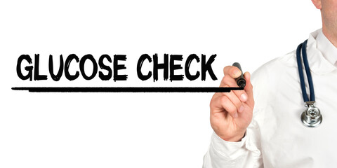 Doctor writes the word - GLUCOSE CHECK. Image of a hand holding a marker isolated on a white background.
