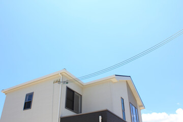 Fototapeta na wymiar 新築住宅の電気の引き込み線