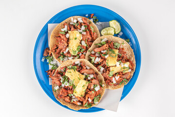 Traditional Mexican tacos called Al Pastor
Authentic seasoned pork tacos served with sliced...