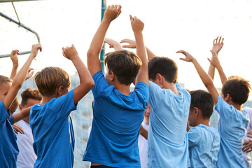 happy football players celebrate the winning, cheerful football team win in competition, have fun