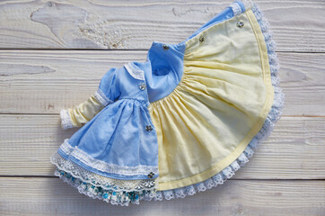 Doll dress on the wrong side. Hobby miniaturism
