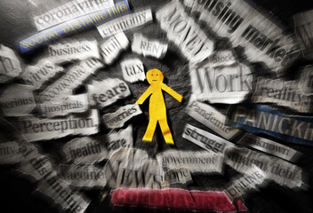 Coronavirus and economic news headlines surrounding paper man