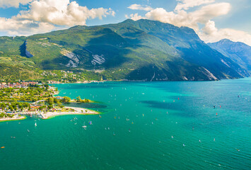 Naklejka premium Aerial view at Linfano and Torbole village at lake Garda, Italy. on a beautiful summer day