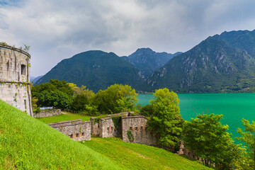 Fototapeta na wymiar Sightseeing at the beautiful landscape of lake Idro Rocca d'Anfo Italy, ruins of a old bunker