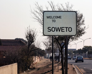  Welcome to Soweto is  roadside welcome banner inviting you to visit the Soweto area of Johannesburg.