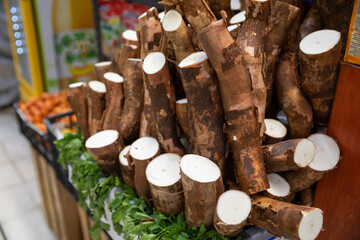 raw sweet potato on stall of a popular market in Mexico