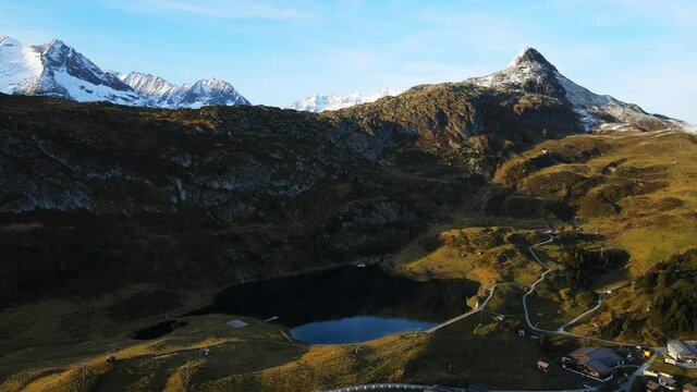 Beautiful moutain lake in the Swiss Alps called Blausee at Bettmeralp Switzerland - aerial view