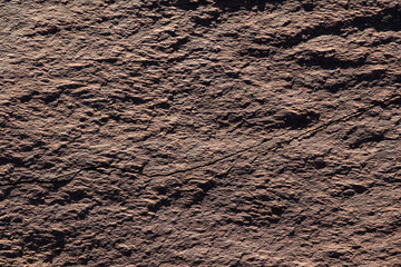 Dark embossed surface stone texture. Solid concept. Abstract natural pattern for design. Textured...