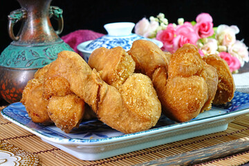 Deep fried dough fritters or 