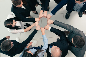 top view. group of young professionals standing in a circle