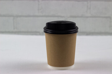 Brown coffee mock up on blank background for design any ideas. Paper mug cup template for cafe or restaurant create identity set.