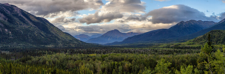 Fototapeta premium Panoramic View of Scenic Mountains and Landscape on a Cloudy Morning in Canadian Nature. Taken in Northern British Columbia, Canada.