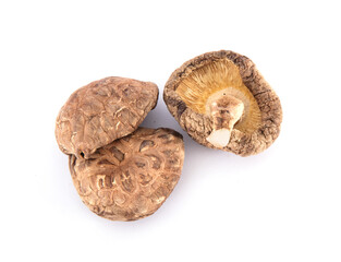 A pile of dried mushrooms on white background