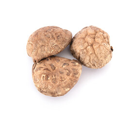 A pile of dried mushrooms on white background