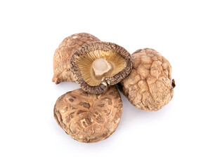 A pile of dried mushrooms on white background