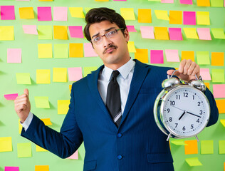 Businessman with many business priorities