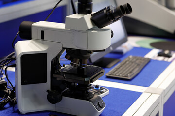 Fototapeta na wymiar trinocular optical microscope in a laboratory