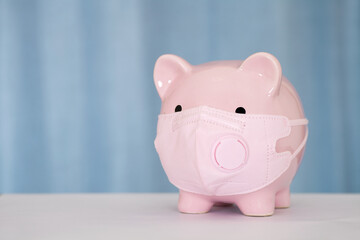 Piggy piggy bank wearing N95 mask