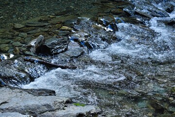 water flowing into the river