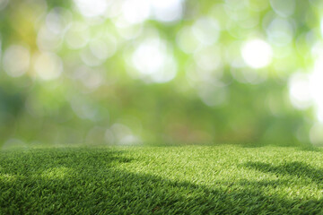 Natural green background It is a lawn with a blurred green background. Bokeh can be used as a background.